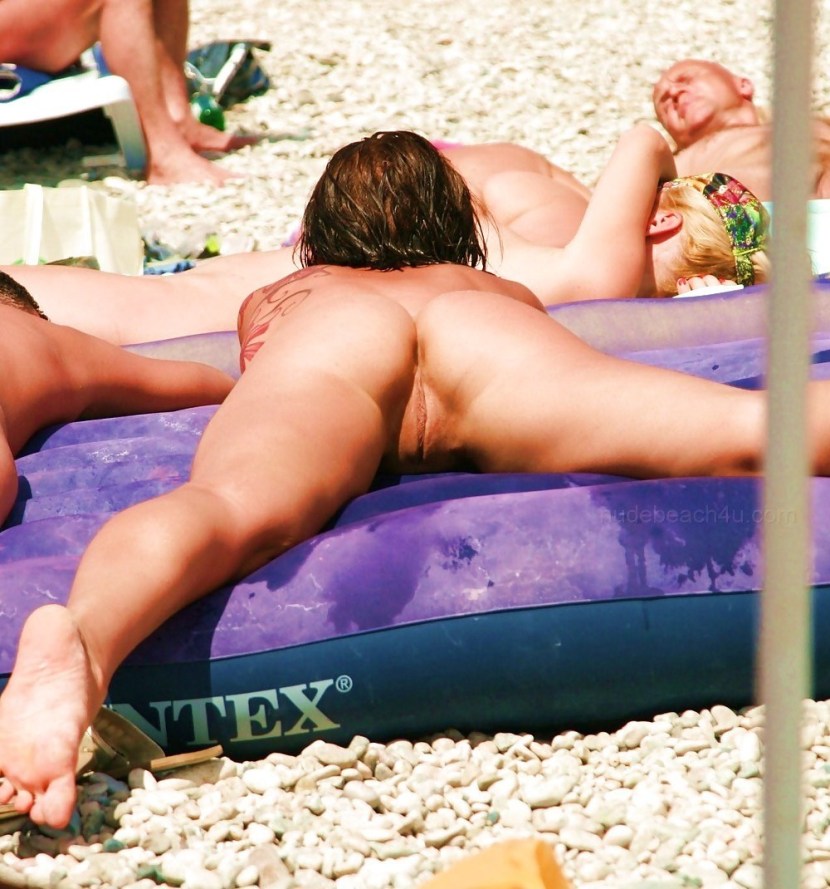 Naked female priests on the beach