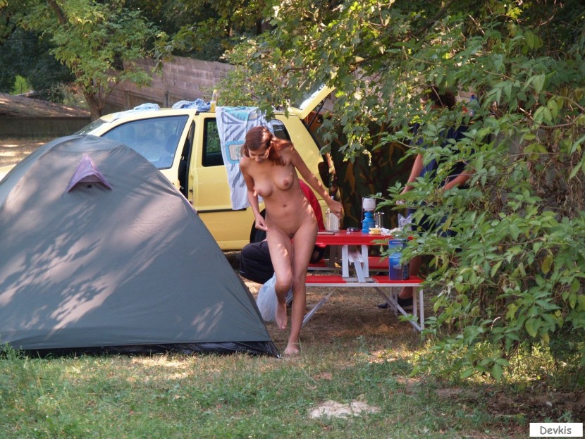 Naked nudist in a campsite