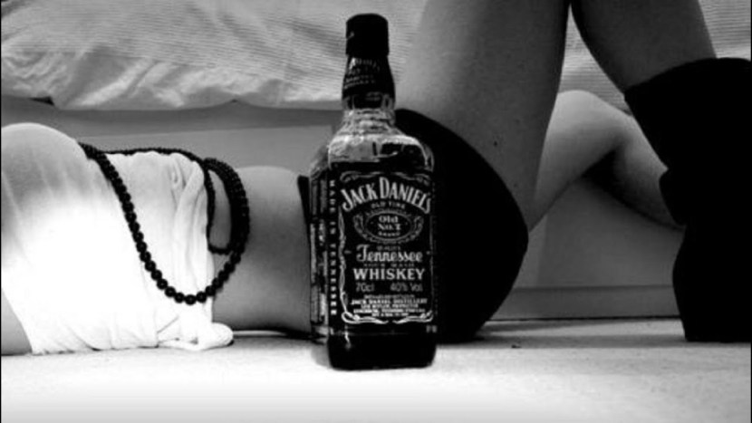 Girl with a bottle Jack Daniels