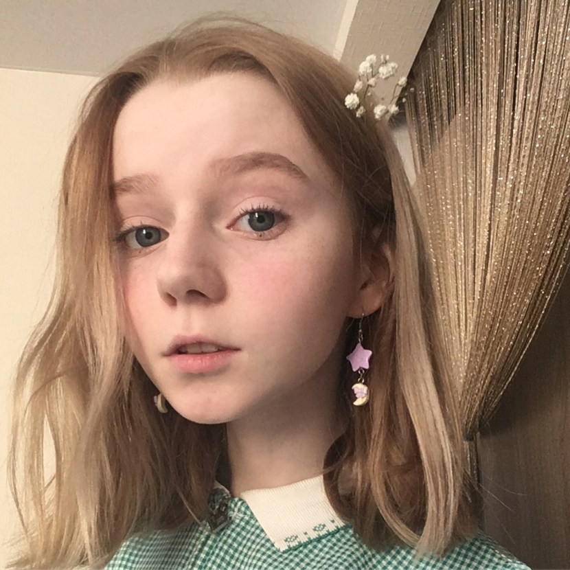 The girl sits on the dildo