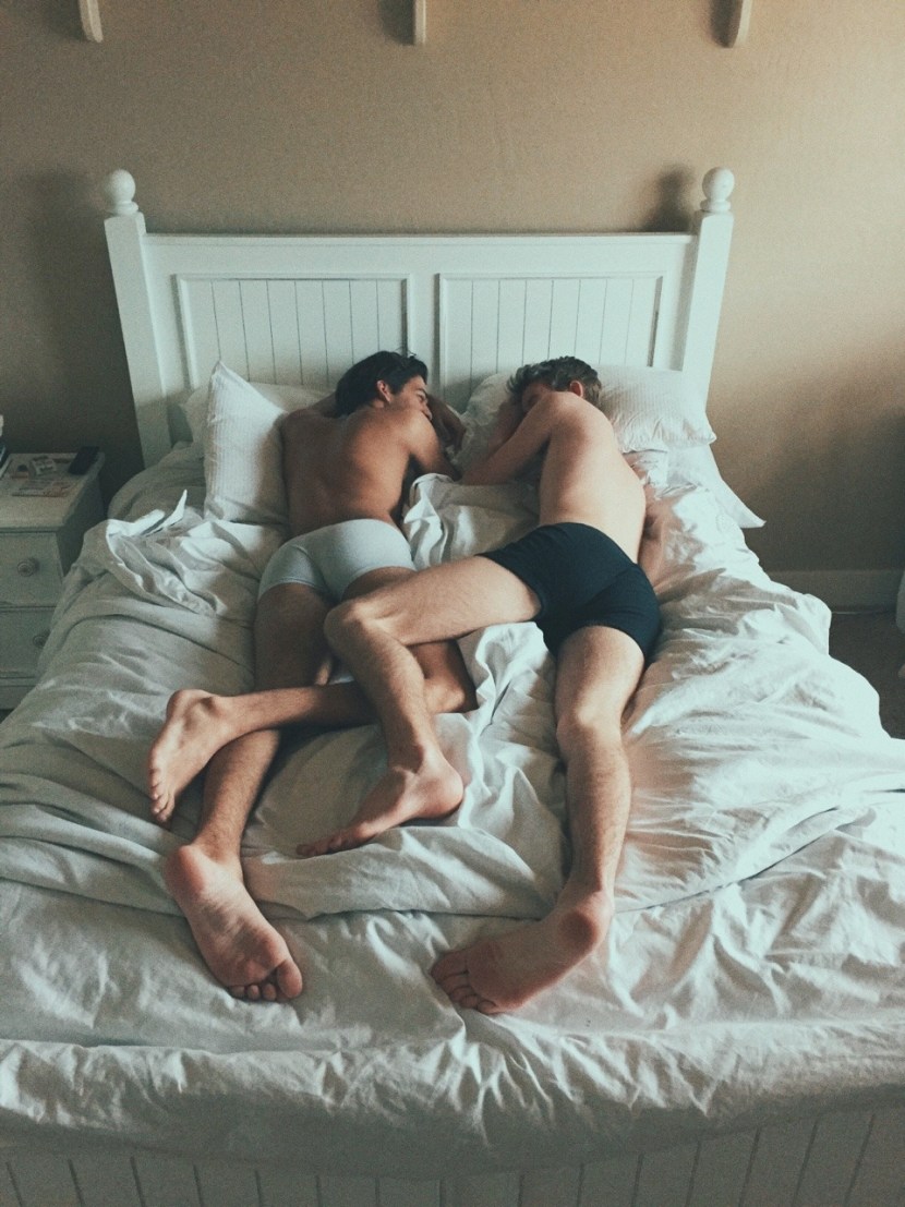 Anime girl lies on a guy