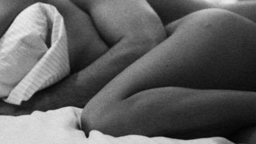 Erotic caressing on the couch