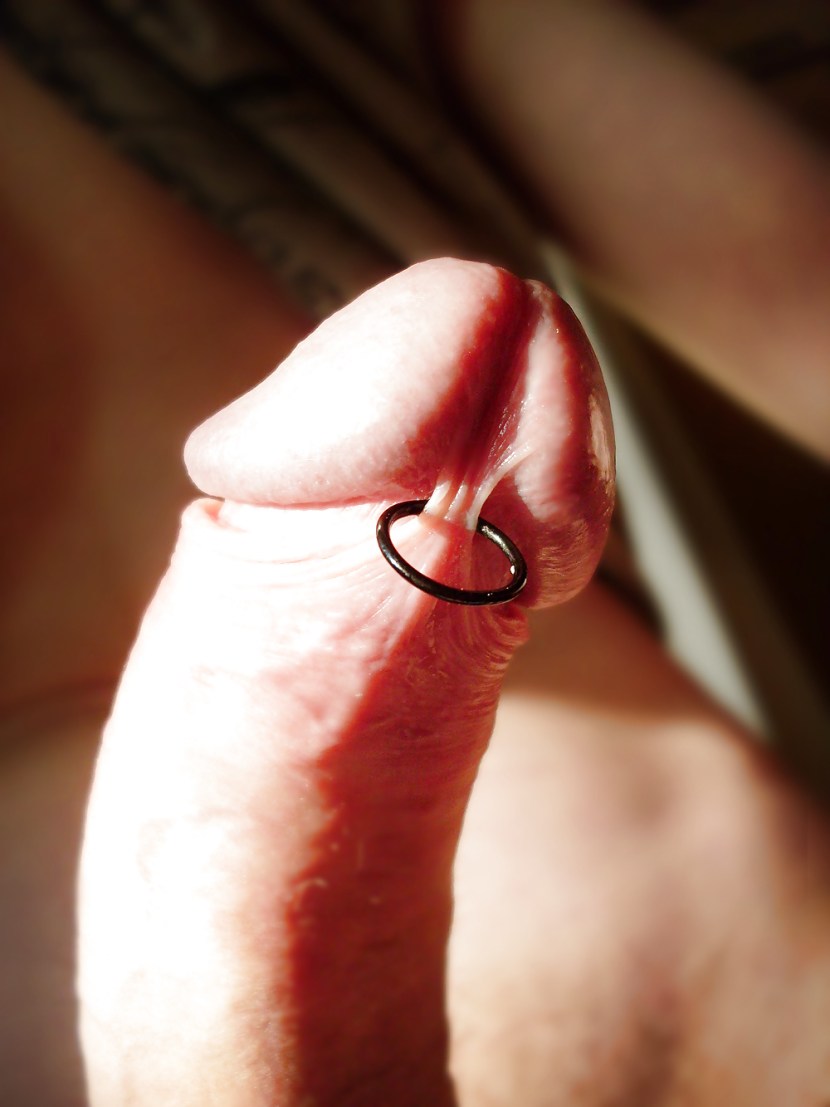 Male intimate piercing of a member