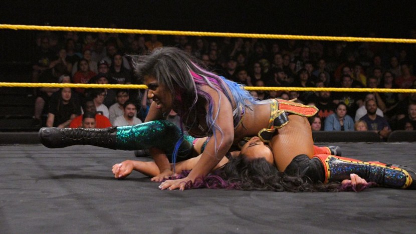 Headscissors in a swimsuit