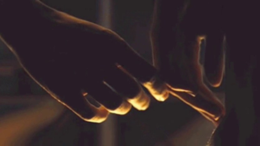 The man pressed against the wall