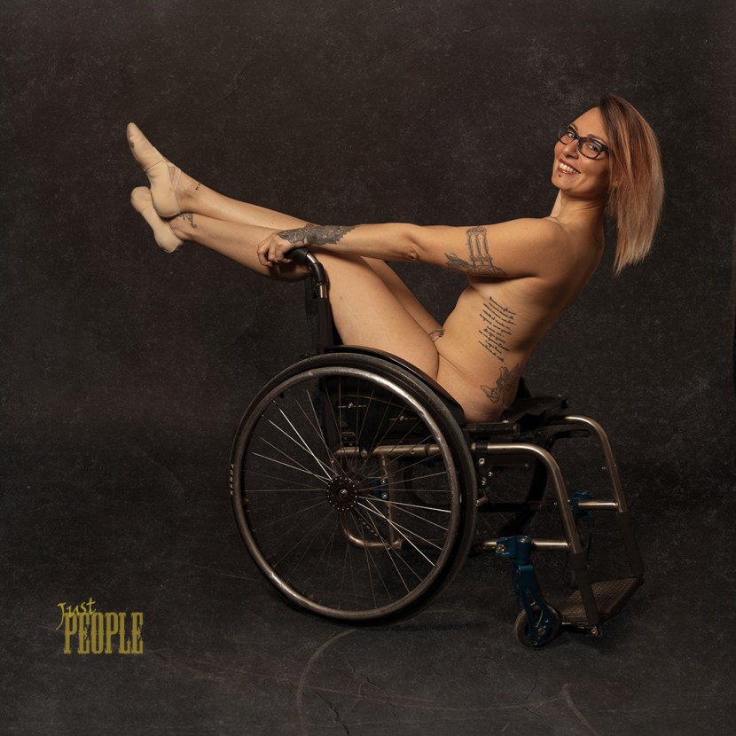 Naked women in a wheelchair