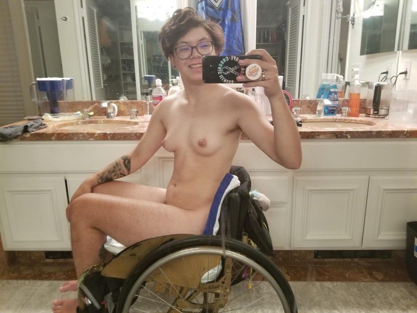 Naked women in a wheelchair
