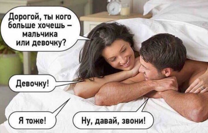 Naked guys kiss in bed