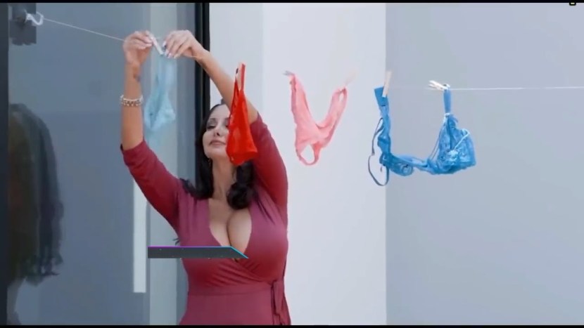 Caitlin Syragus in a dress