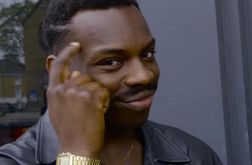 Negro with a finger at the temple