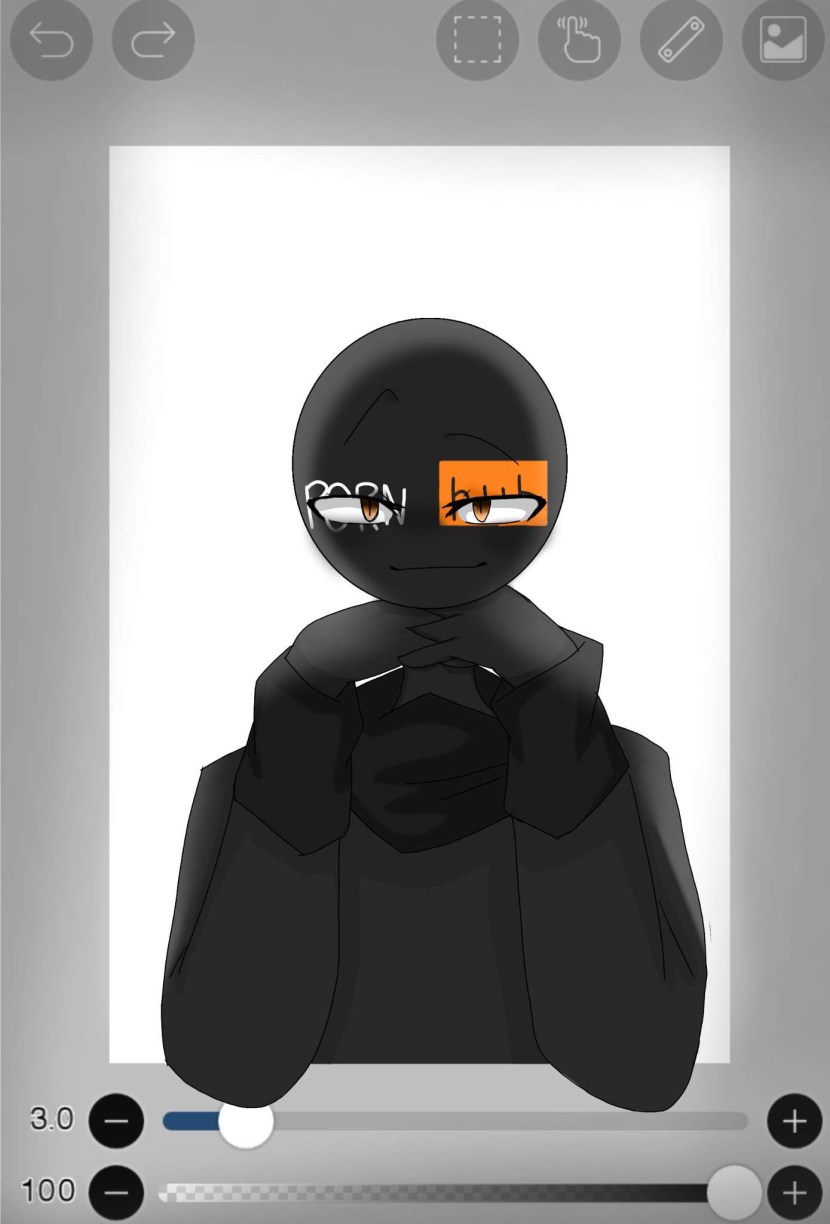 Red smartphone near a laptop