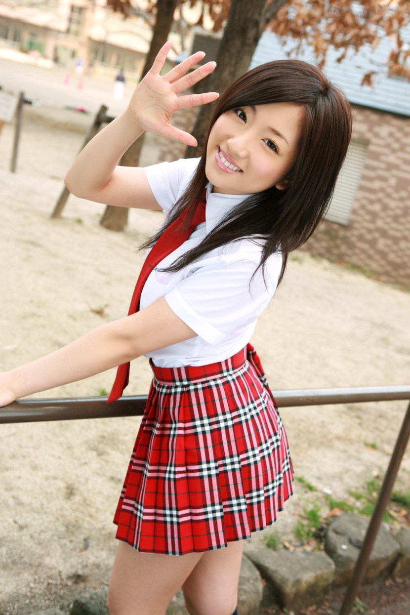 Schoolgirl in a checkered skirt