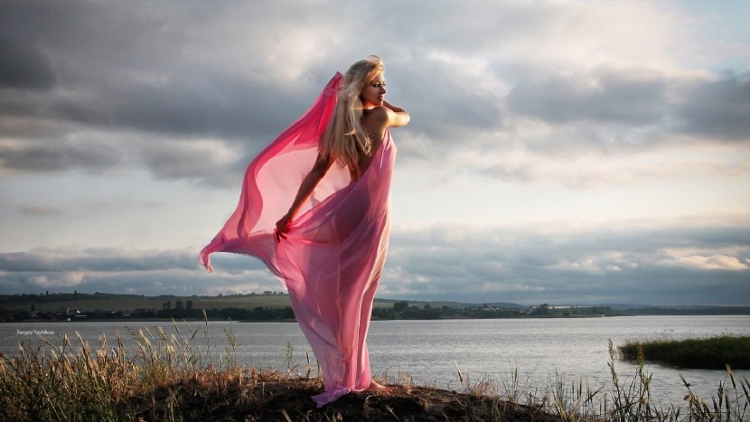 Girl in a dress in the wind